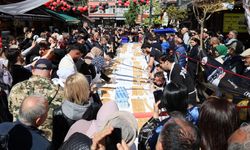 5 dakikada 11 metre börek yedi, 10 gram altının sahibi oldu