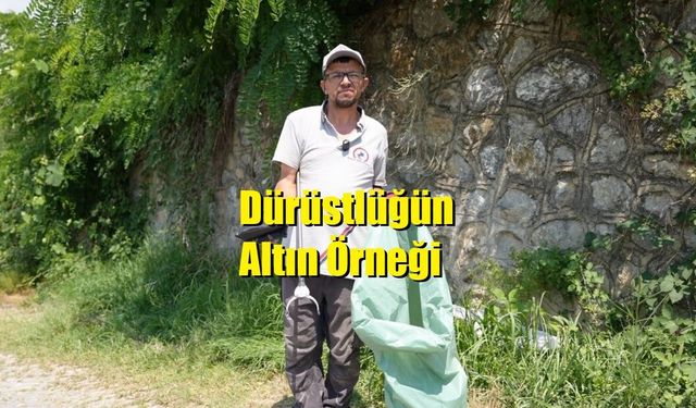Düzce’de temizlik işçisi bulduğu altın dolu çantayı polise teslim etti